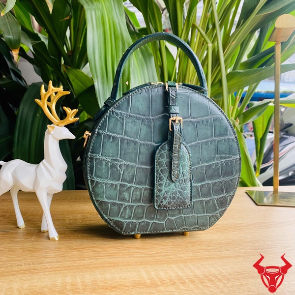 Túi Xách Nữ Sang Trọng Màu Xanh Lục Túi tròn da cá sấu bền đẹp xanh lục.