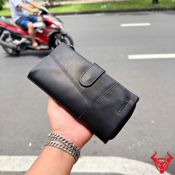Ví Cầm Tay Da Bò Cao Cấp VICT02 Màu Đen Cho Nữ Ví cầm tay nữ VICT02 màu đen bằng da bò cao cấp, bền đẹp và tiện dụng.